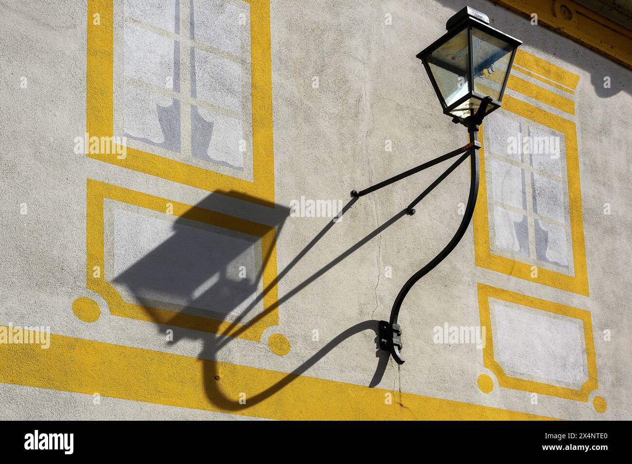 Lantern with shadow at the town theatre, Kaufbeuern, Allgäu, Swabia, Bavaria, Germany, Europe Stock Photo