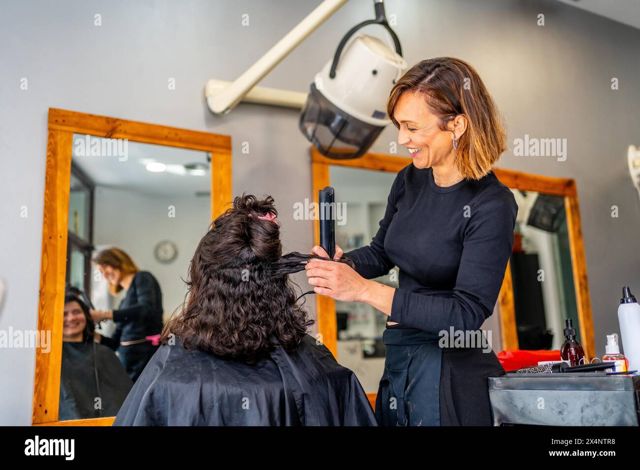 Female client in hair hi-res stock photography and images - Alamy