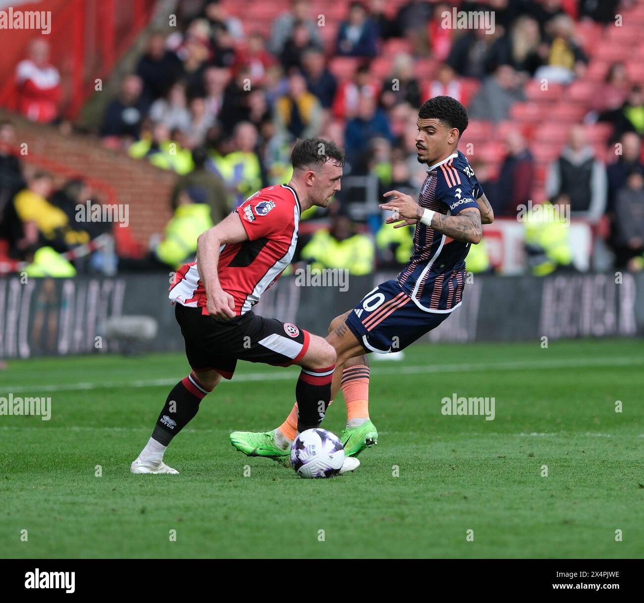 Bramall Lane, Sheffield, UK. 4th May, 2024. Premier League Football, Sheffield United versus Nottingham Forest; Jack Robinson of Sheffield Utd looks to beat Morgan Gibbs-White of Nottingham Forest Credit: Action Plus Sports/Alamy Live News Stock Photo