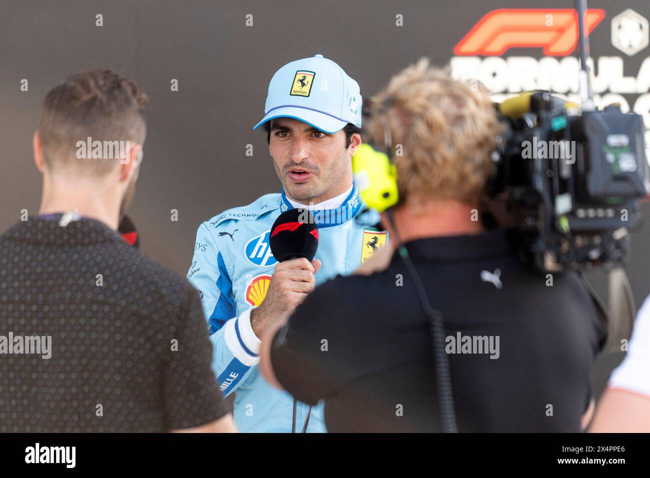 Miami Gardens, United States. 04th May, 2024. Spanish Formula One driver Carlos Sainz Jr. of Scuderia Ferrari is interviewed following qualifying for the Formula One Miami Grand Prix at the Miami International Autodrome in Miami Gardens, Florida on Saturday, May 4, 2024 Photo by Greg Nash/UPI Credit: UPI/Alamy Live News Stock Photo