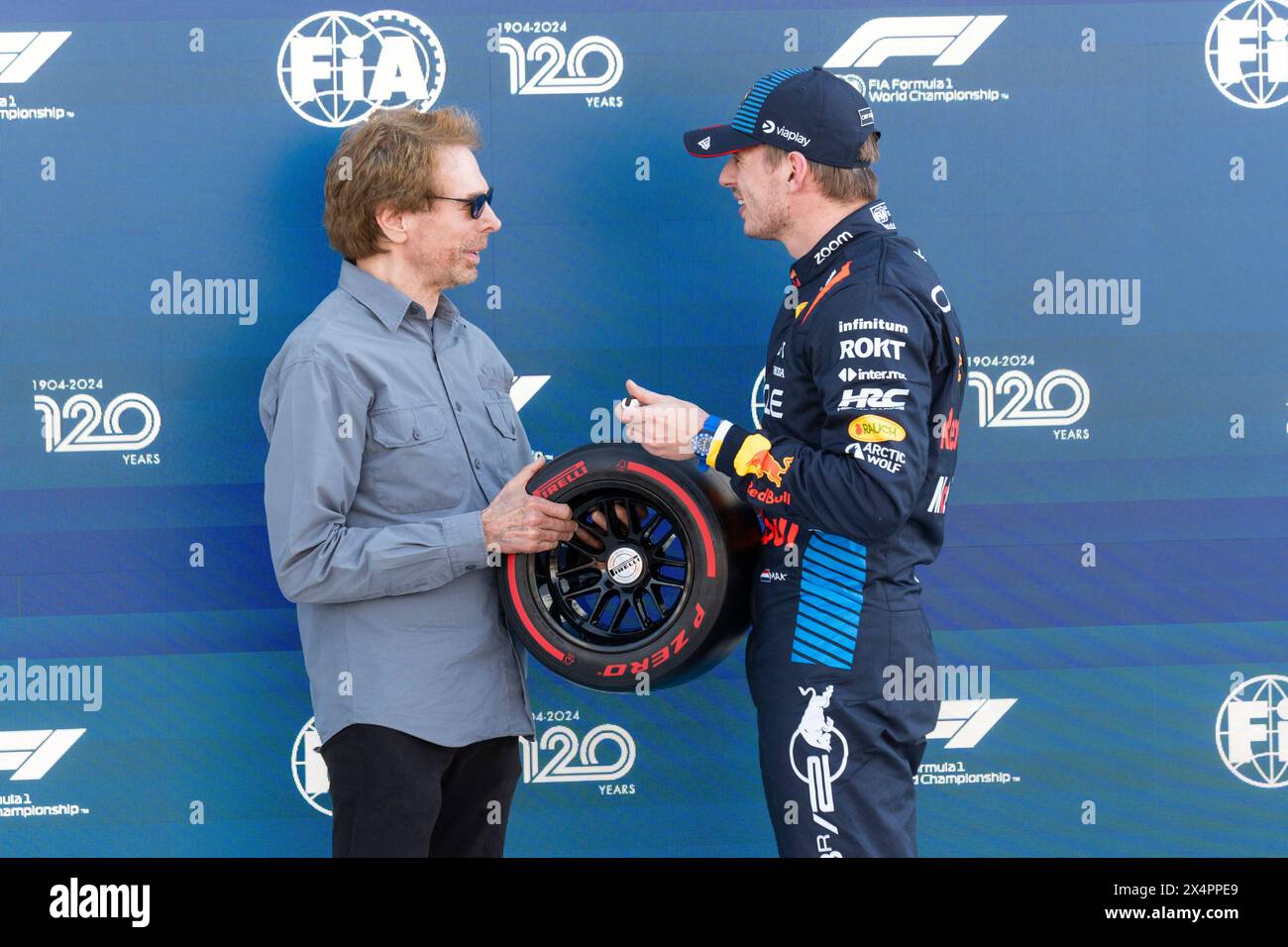Miami Gardens, United States. 04th May, 2024. Producer Jerry Bruckheimer speaks with Dutch Formula One driver Max Verstappen of Red Bull Racing while presenting the pole award following qualifying for the Formula One Miami Grand Prix at the Miami International Autodrome in Miami Gardens, Florida on Saturday, May 4, 2024 Photo by Greg Nash/UPI. Credit: UPI/Alamy Live News Stock Photo