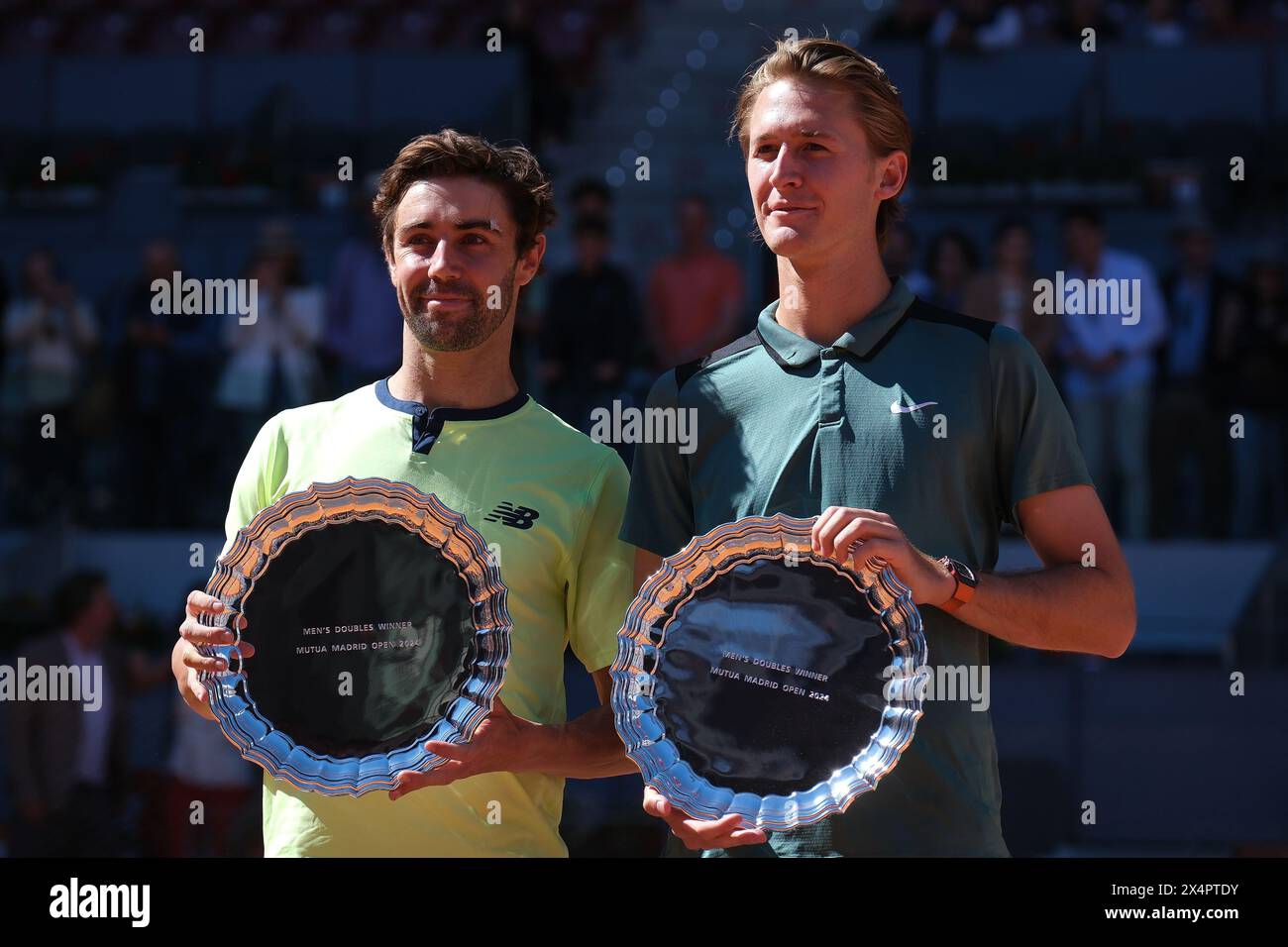 Madrid, Spain. 05th May, 2024. Jordan Thompson and Sebastian Korda pose for with their Mutua Madrid Open Men's Doubles trophies following victory during the Doubles Final match at La Caja Magica on May 04, 2024 in Madrid, Spain (Photo by Oscar Gonzalez/Sipa USA) Credit: Sipa USA/Alamy Live News Stock Photo