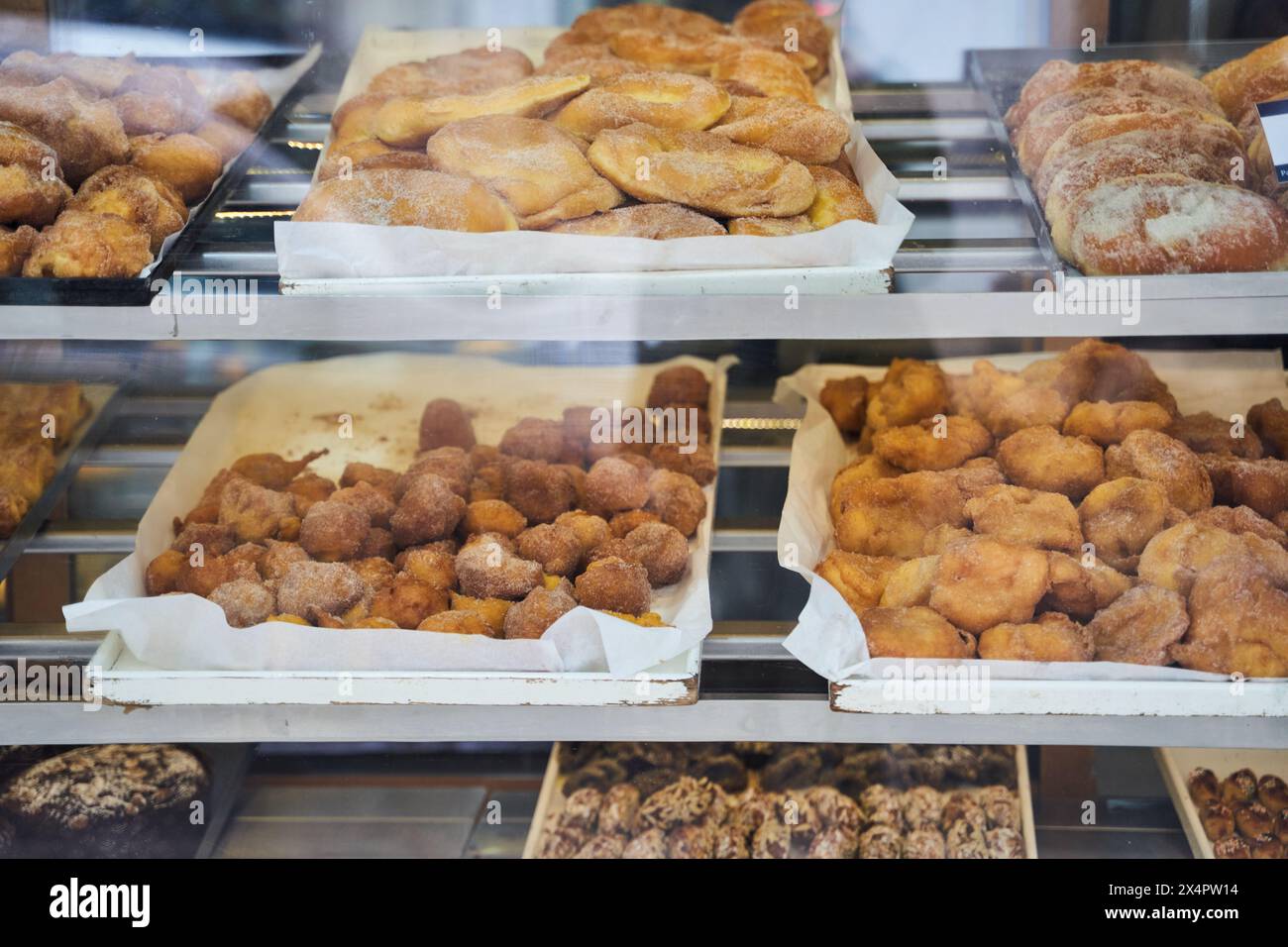 Bakery showcases an array of baked goods with various ingredients and recipes Stock Photo