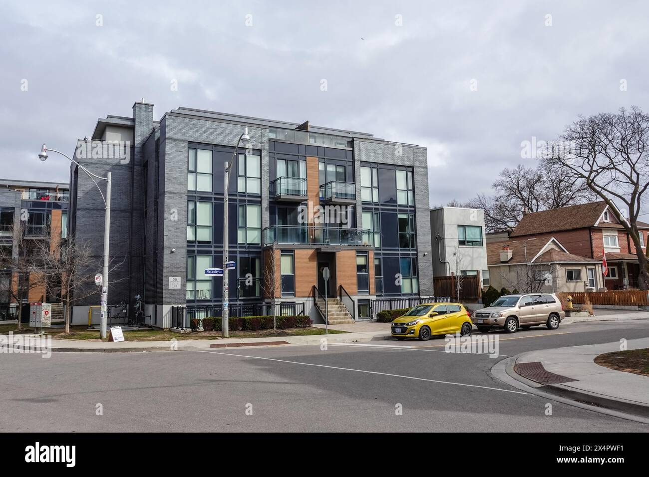 A modern and new residential 3 story high building with multiple rental units, in the Junction area of Toronto Ontario Canada Stock Photo
