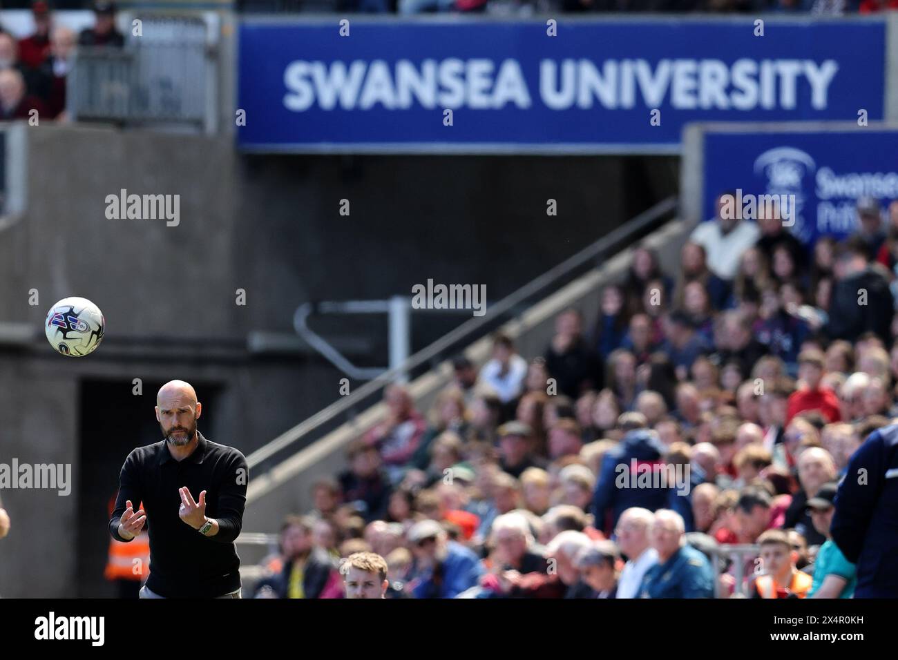 Swansea, UK. 04th May, 2024. Luke Williams, the head coach/manager of Swansea City FC looks on during the game. EFL Skybet championship match, Swansea city v Millwall at the Swansea.com Stadium in Swansea, Wales on Saturday 4th May 2024. this image may only be used for Editorial purposes. Editorial use only, pic by Andrew Orchard/Andrew Orchard sports photography/Alamy Live news Credit: Andrew Orchard sports photography/Alamy Live News Stock Photo
