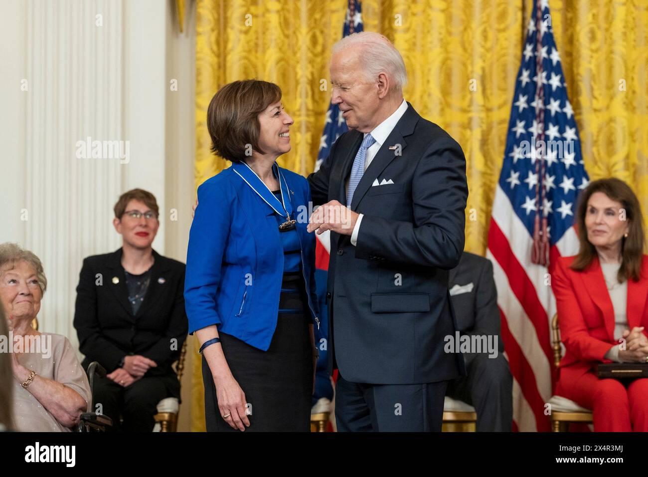 Washington, United States Of America. 03rd May, 2024. Washington, United States of America. 03 May, 2024. U.S President Joe Biden, embraces NASA astronaut and former director of the Johnson Space Center Ellen Ochoa after presenting her the Presidential Medal of Freedom during the awards ceremony at East Room of the White House, May 3, 2024 in Washington, DC The Presidential Medal of Freedom is the nation's highest civilian award. Credit: Cameron Smith/White House Photo/Alamy Live News Stock Photo