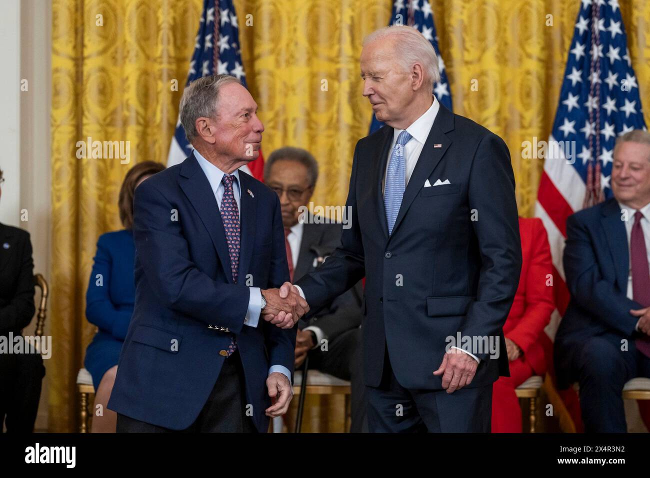 Washington, United States Of America. 03rd May, 2024. Washington, United States of America. 03 May, 2024. U.S President Joe Biden, presents the Presidential Medal of Freedom to billionaire and former New York City Michael Bloomberg, left, during the awards ceremony at East Room of the White House, May 3, 2024 in Washington, DC The Presidential Medal of Freedom is the nation's highest civilian award. Credit: Cameron Smith/White House Photo/Alamy Live News Stock Photo