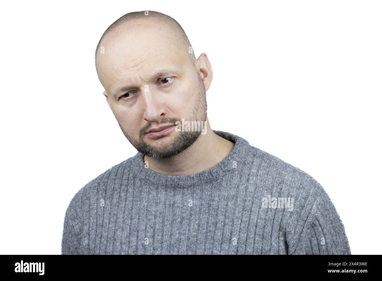 This is a poignant portrait of a man, set against a stark white background, embodying the struggle of living with depression. Stock Photo