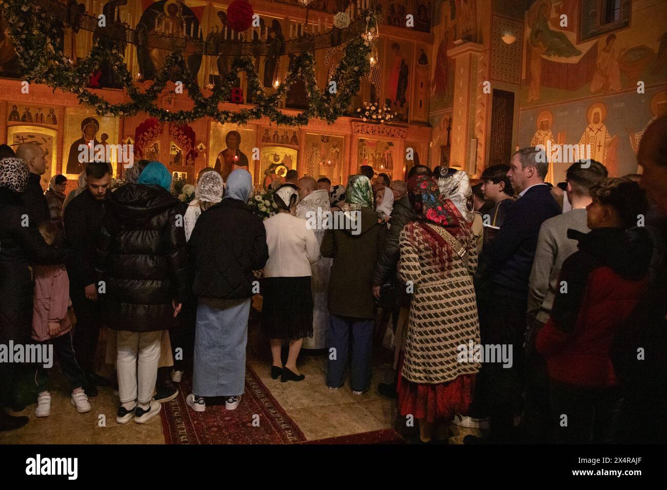 London, UK. 5th May 2024. Worshippers have come together for a midnight service at the Russian Orthodox Cathedral of the Nativity of the Most Holy Mother of God and the Holy Royal Martyrs in West London to celebrate the rising of Christ. Credit: Kiki Streitberger/Alamy Live News Stock Photo
