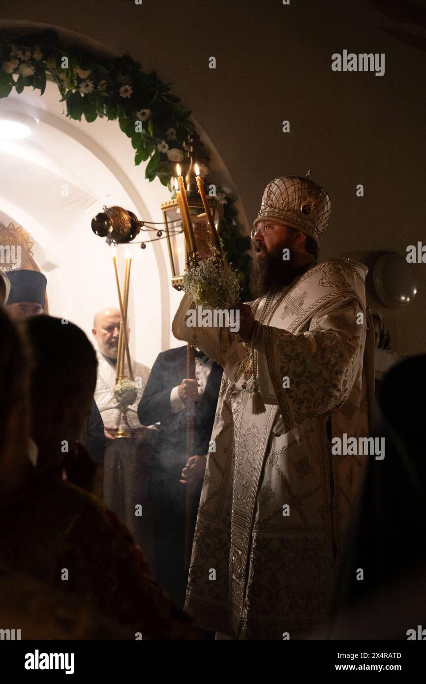 London, UK. 5th May 2024. Bishop Irenei blesses worshippers at the Easter midnight service at the Russian Orthodox Cathedral of the Nativity of the Most Holy Mother of God and the Holy Royal Martyrs in West London. Credit: Kiki Streitberger/Alamy Live News Stock Photo