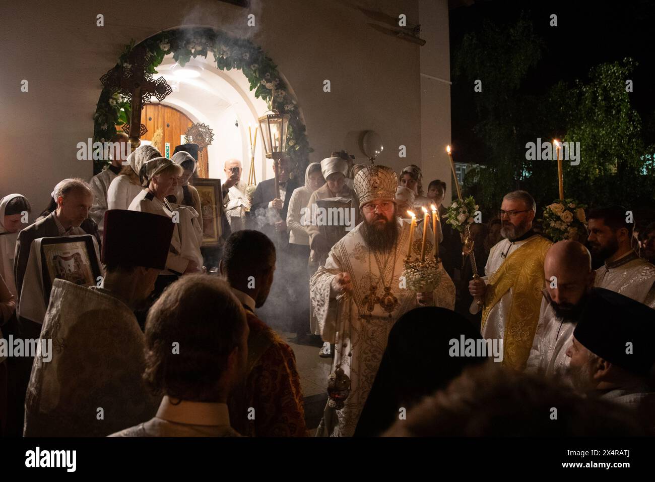 London, UK. 5th May 2024. Bishop Irenei blesses worshippers at the Easter midnight service at the Russian Orthodox Cathedral of the Nativity of the Most Holy Mother of God and the Holy Royal Martyrs in West London. Credit: Kiki Streitberger/Alamy Live News Stock Photo