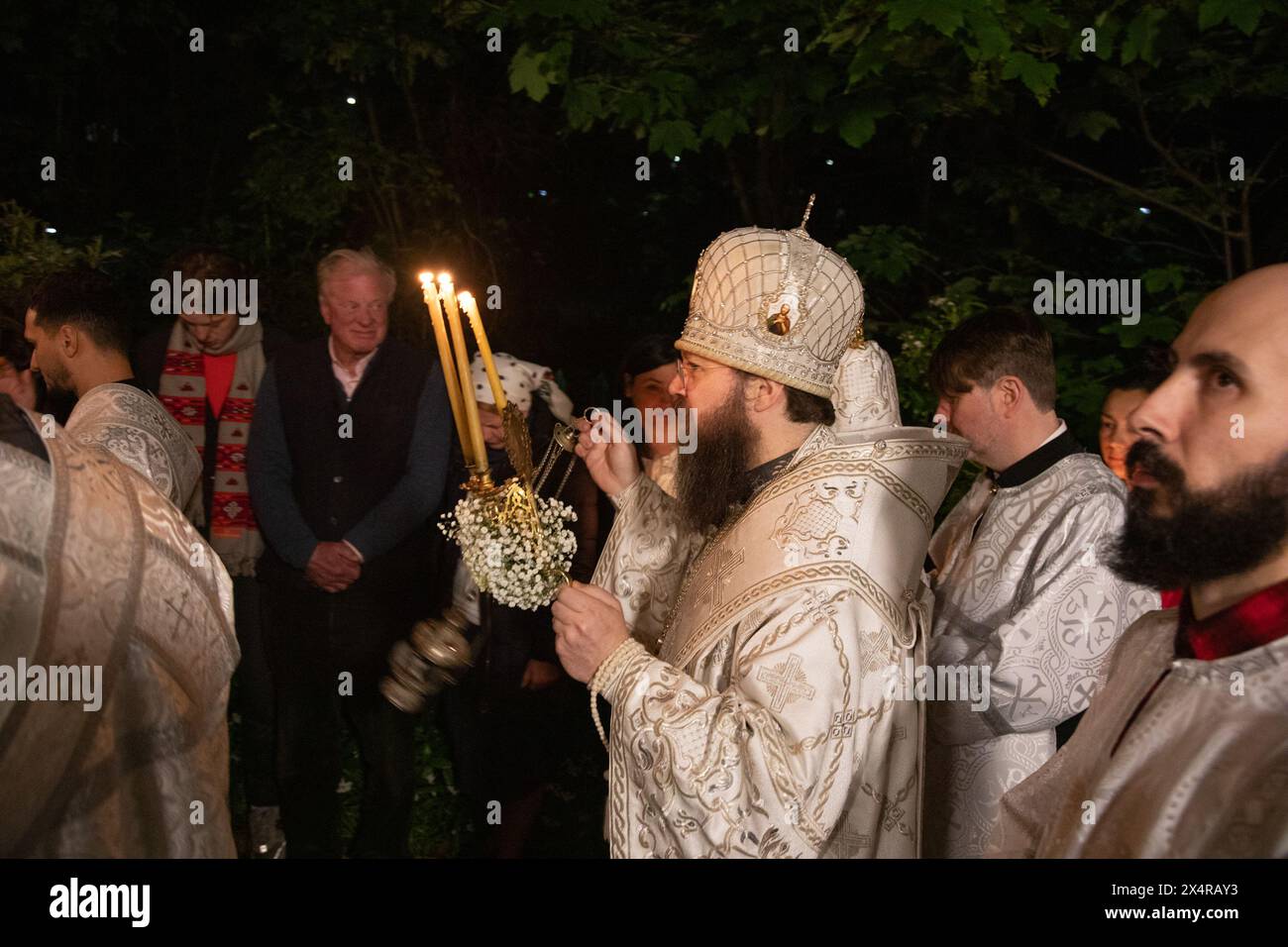 London, UK. 5th May 2024. Bishop Irenei blesses worshipers who have gathered for a midnight Easter service at the Russian Orthodox Cathedral of the Nativity of the Most Holy Mother of God and the Holy Royal Martyrs in West London to celebrate the rising of Christ. Credit: Kiki Streitberger/Alamy Live News Stock Photo