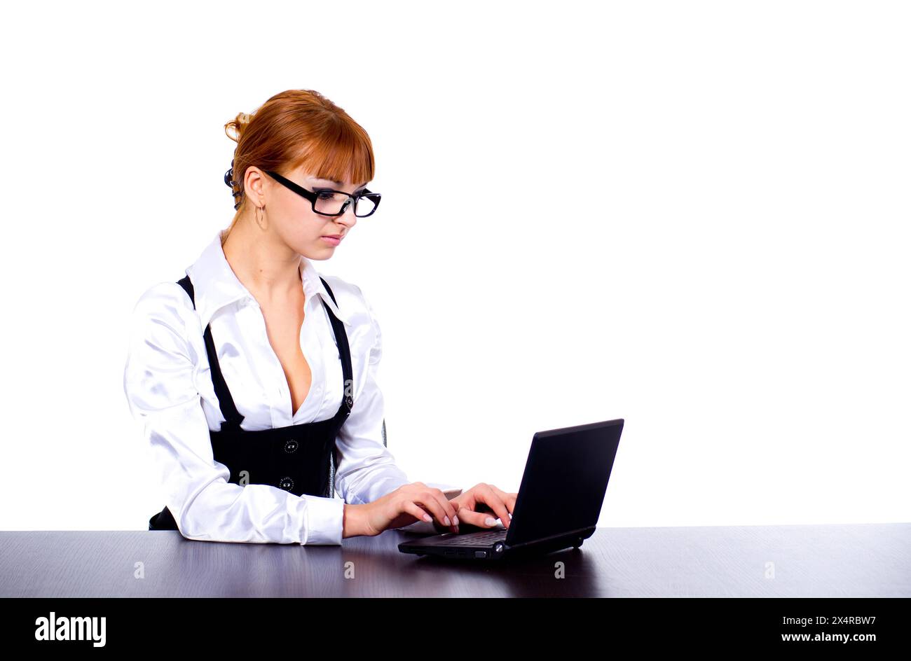 Red hair woman typing hi-res stock photography and images - Alamy