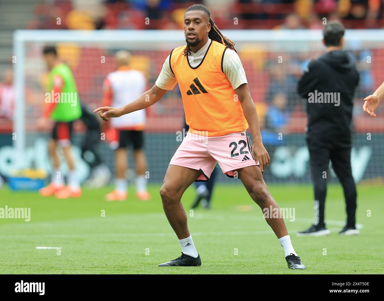 London, UK. 4th May, 2024. Alex Iwobi of Fulham warms up during the Premier League match at Gtech Community Stadium, London. Picture credit should read: Paul Terry/Sportimage Credit: Sportimage Ltd/Alamy Live News Stock Photo