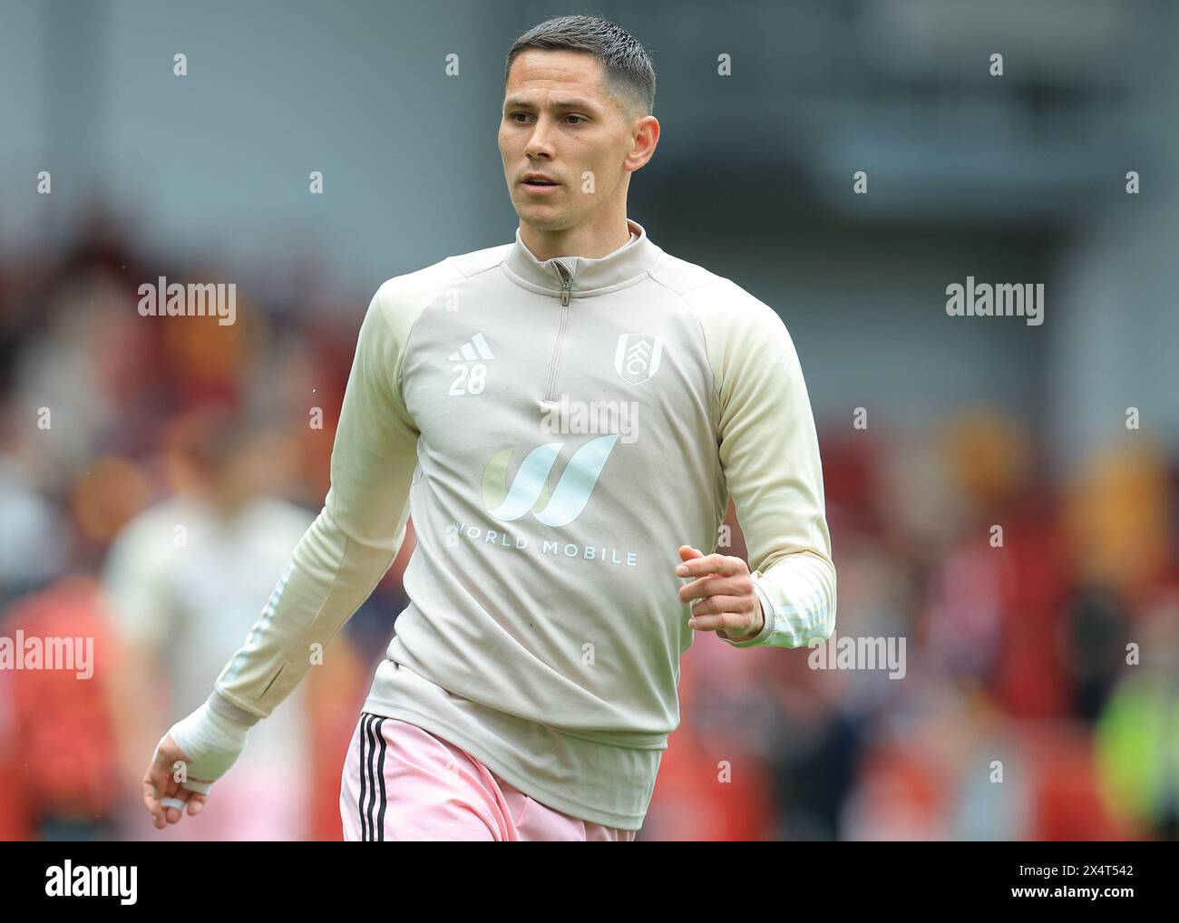 London, UK. 4th May, 2024. Sasa Lukic of Fulham warms up before the Premier League match at Gtech Community Stadium, London. Picture credit should read: Paul Terry/Sportimage Credit: Sportimage Ltd/Alamy Live News Stock Photo