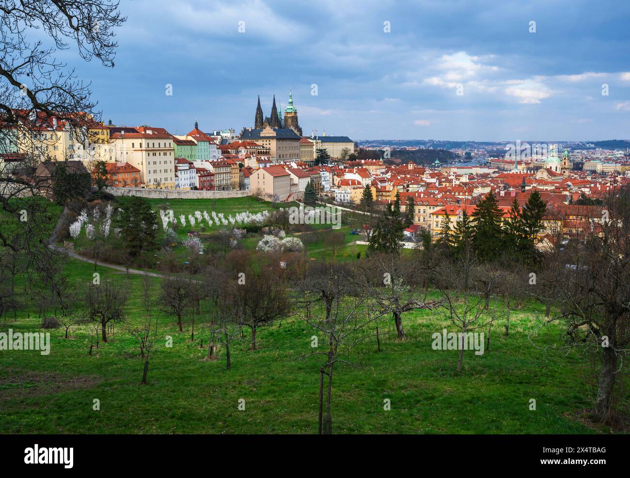 Prague castle and blooming Strahov garden, picturesque building with red roof in Prague, Czech republic. Stock Photo
