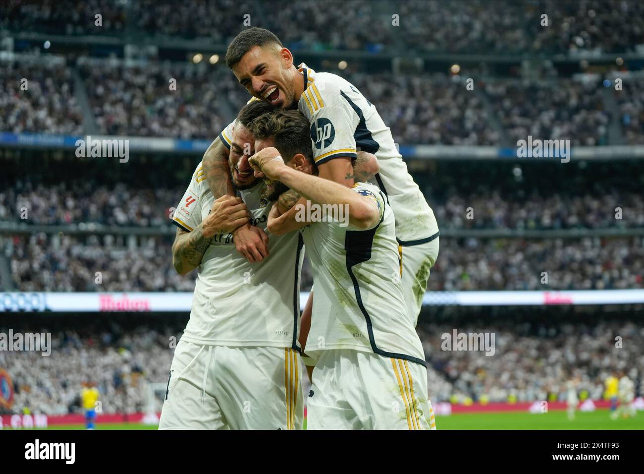 Madrid, Spain. 04th May, 2024. Joselu Mato of Real Madrid celebrates with his teammates after scoring goal during the La Liga match between Real Madrid and Cadiz CF played at Santiago Bernabeu Stadium on May 4, 2024 in Madrid, Spain. (Photo by Cesar Cebolla/PRESSINPHOTO) Credit: PRESSINPHOTO SPORTS AGENCY/Alamy Live News Stock Photo