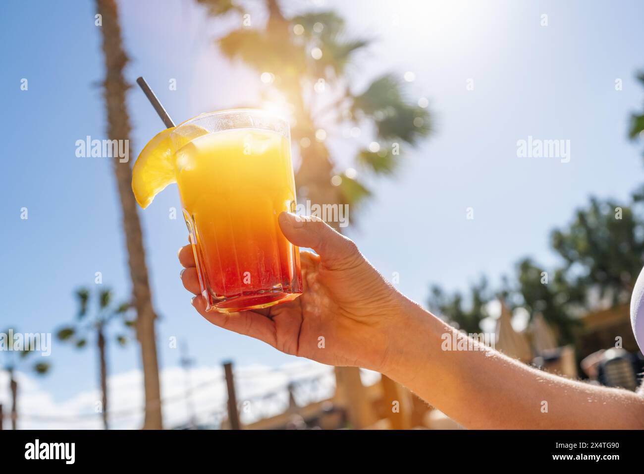 Close up hand holding cocktail hi-res stock photography and images - Alamy
