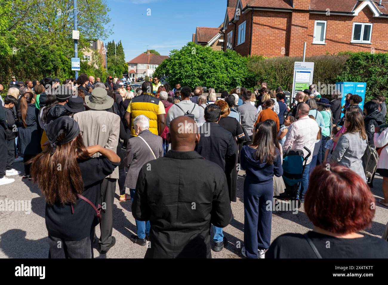 People attend a vigil at Hainault Underground Station Car Park, north east London, in memory of 14-year-old Daniel Anjorin, who was killed in a sword attack on Tuesday, that saw four others injured, including two Metropolitan Police officers. Picture date: Sunday May 5, 2024. See PA story POLICE Hainault. Photo credit should read: Jeff Moore/PA Wire Stock Photo