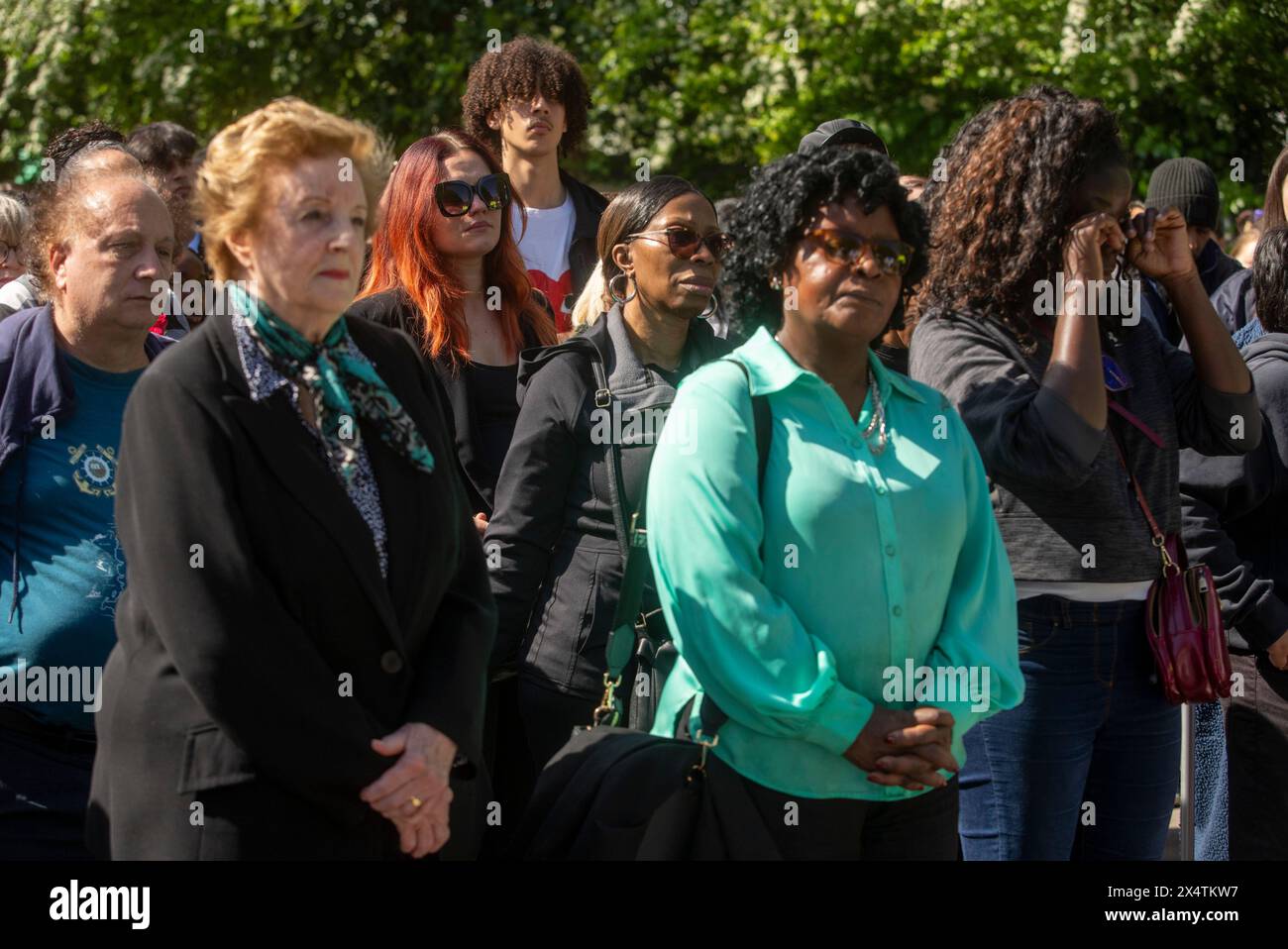 People attend a vigil at Hainault Underground Station Car Park, north east London, in memory of 14-year-old Daniel Anjorin, who was killed in a sword attack on Tuesday, that saw four others injured, including two Metropolitan Police officers. Picture date: Sunday May 5, 2024. See PA story POLICE Hainault. Photo credit should read: Jeff Moore/PA Wire Stock Photo