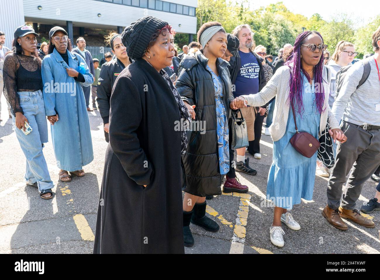 People attend a vigil at Hainault Underground Station Car Park, north east London, in memory of 14-year-old Daniel Anjorin, who was killed in a sword attack on Tuesday, that saw four others injured, including two Metropolitan Police officers. Picture date: Sunday May 5, 2024. See PA story POLICE Hainault. Photo credit should read: Jeff Moore/PA Wire Stock Photo