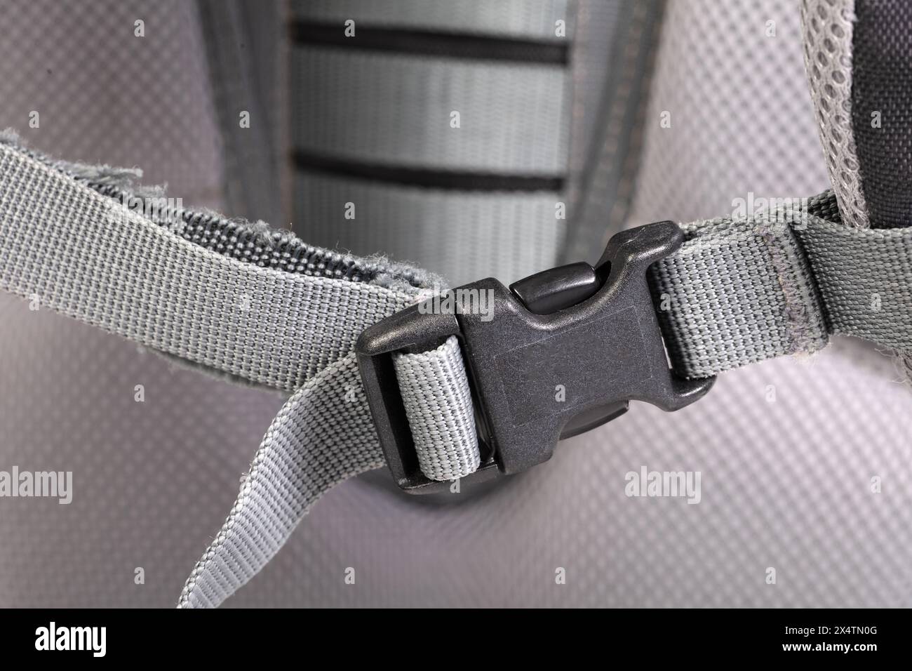 Black plastic clasp of backpack, full frame image Stock Photo