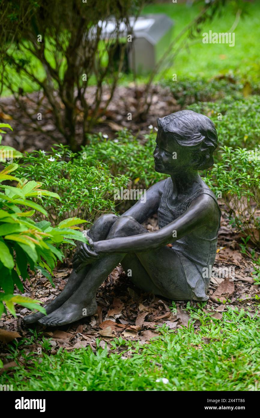 The Nurturing sculpture by Doris Thomas at  Singapore Botanic Gardens, Singapore Stock Photo