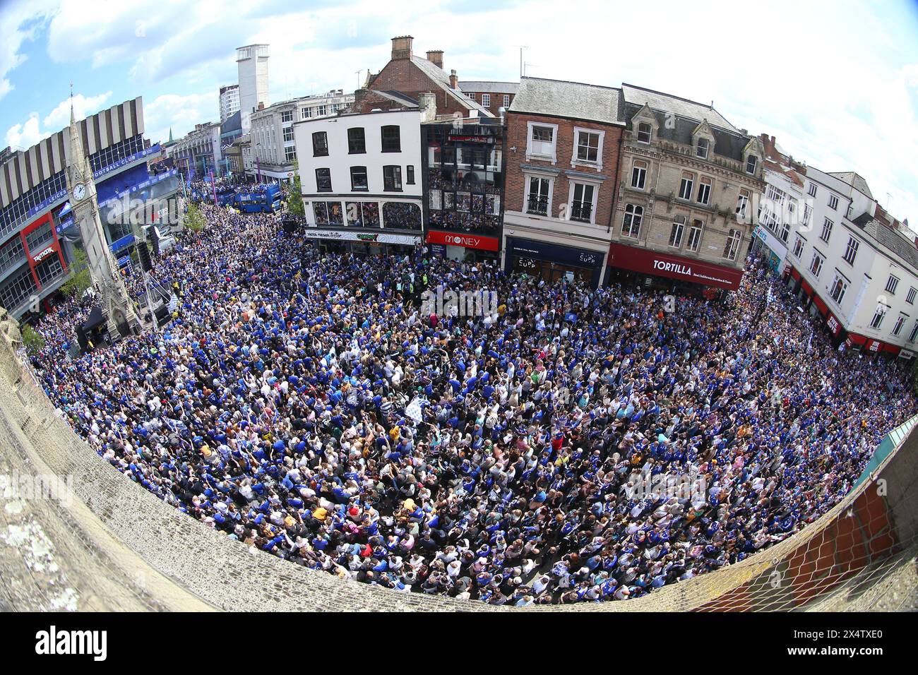 Leicester City players (top left) pass the crowds gathered at Gallowtree Gate during an open-top bus parade in Leicester to celebrate winning the Sky Bet Championship title. Picture date: Sunday May 5, 2024. Stock Photo