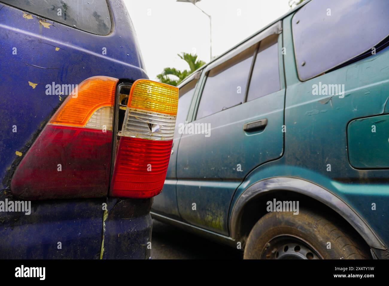 The Damage of a Car Accident Through a Broken Tail Light Stock Photo