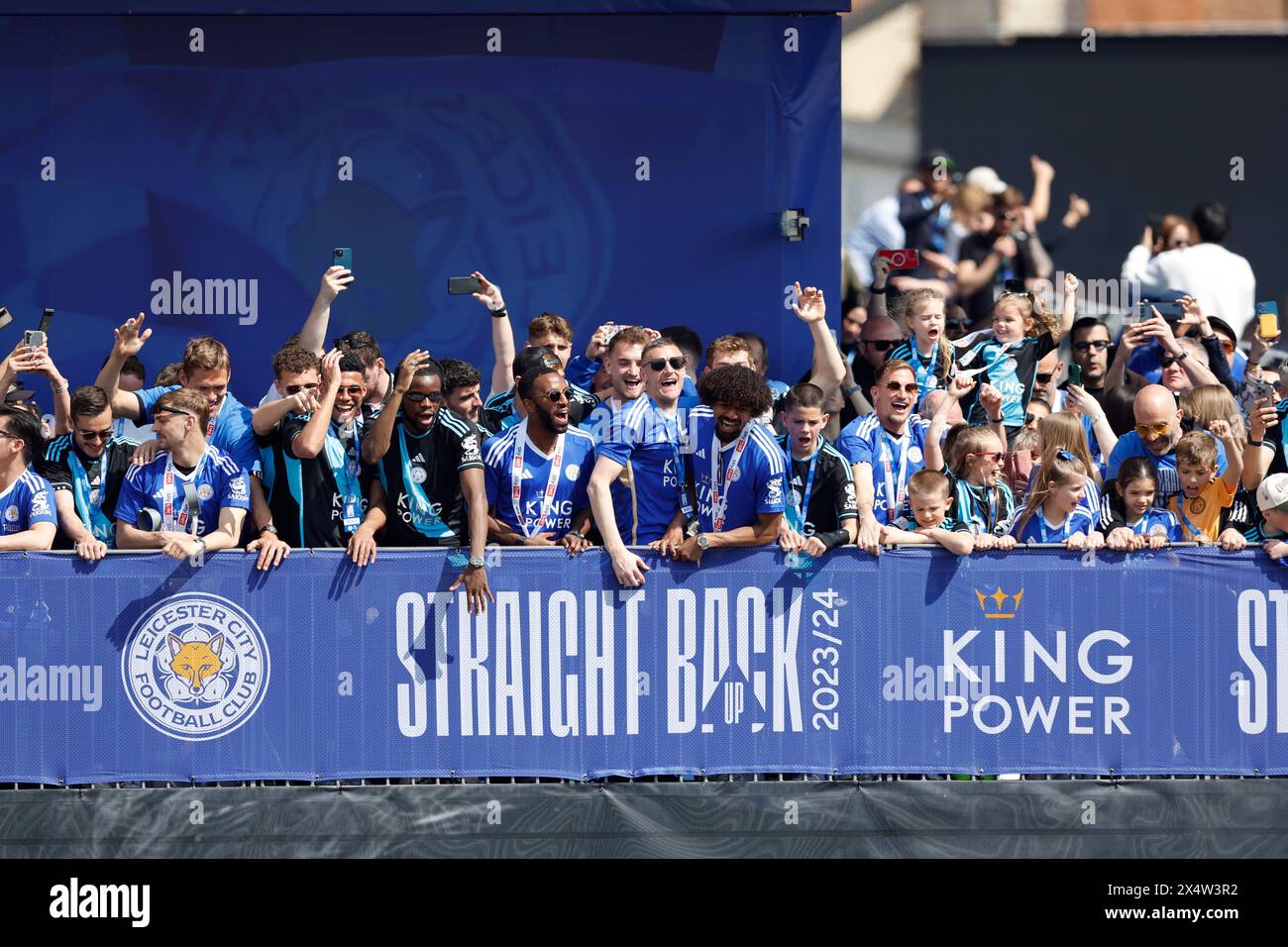 Leicester City players and management on the balcony during a parade in Leicester to celebrate winning the Sky Bet Championship title. Picture date: Sunday May 5, 2024. Stock Photo