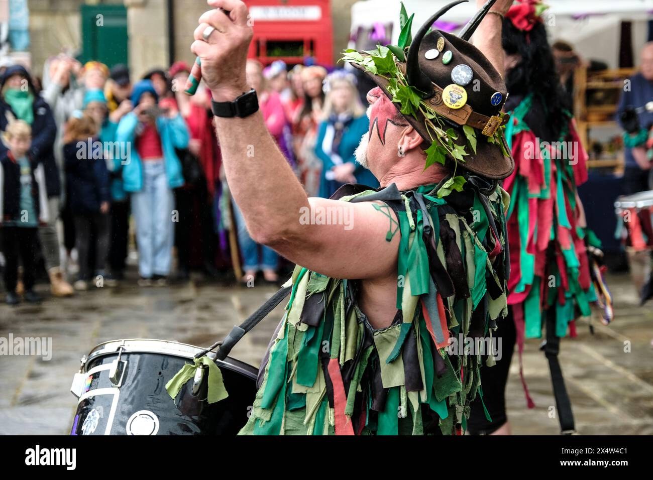 Glastonbury, UK. 5th May, 2024. Pentackle Drummers summon the Dragons. May Fayre and the Dragon procession is part of a week of celebrations to mark Beltane and May Day. The festival has its roots in early Gaelic seasonal celebrations, it fits in well with the new age community that this small Somerset town attracts. Credit: JMF News/Alamy Live News Stock Photo