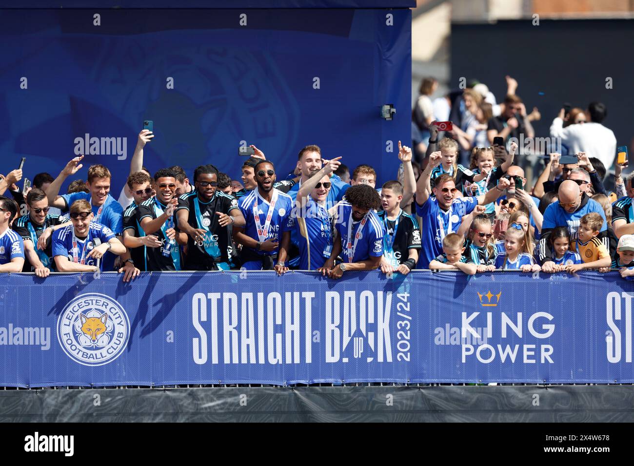 Leicester City's James Justin, Stephy Mavididi, Ricardo Pereira, Jamie Vardy and Hamza Choudhury with other Leicester City players and management on the balcony during a parade in Leicester to celebrate winning the Sky Bet Championship title. Picture date: Sunday May 5, 2024. Stock Photo