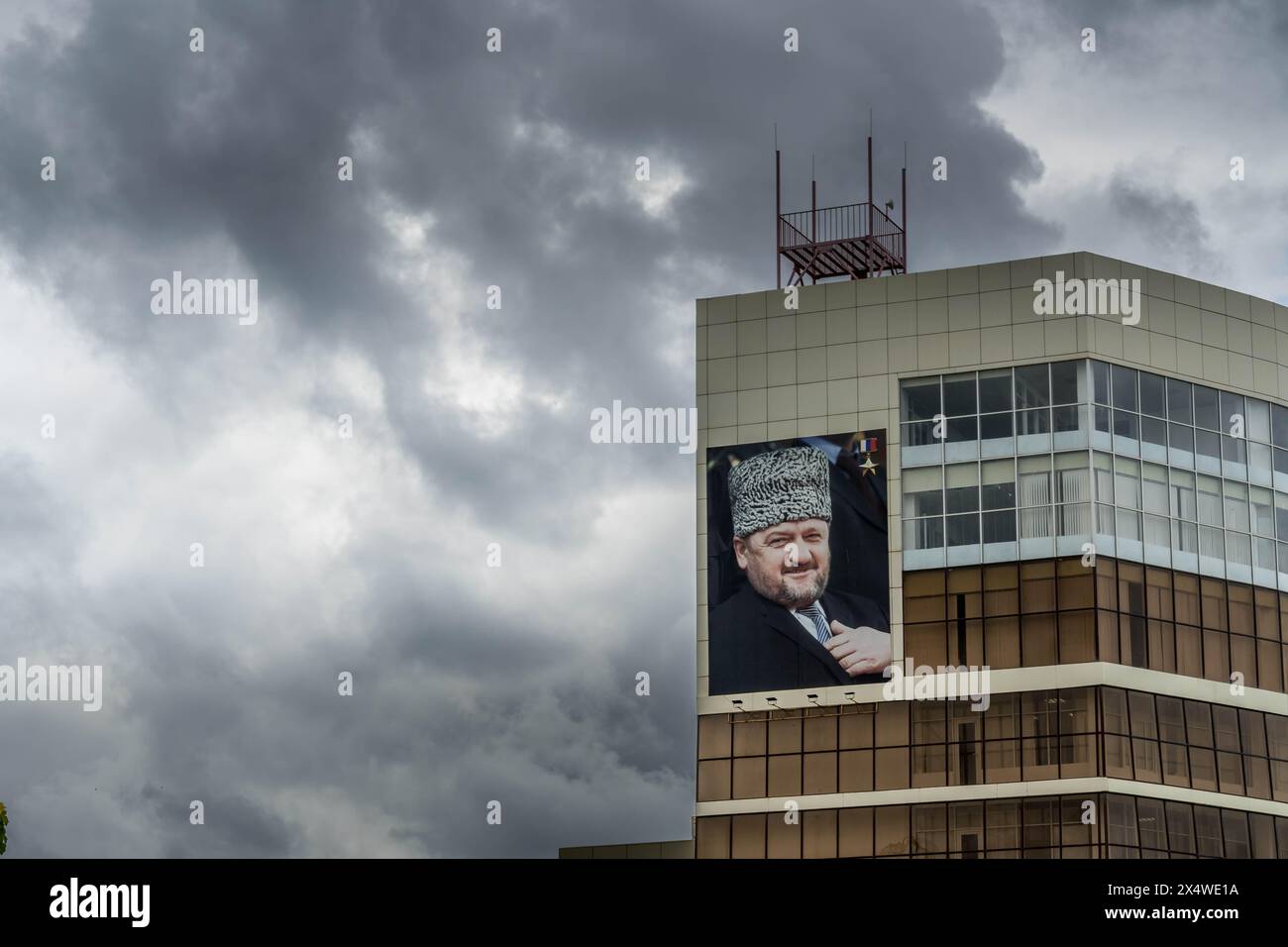 The giant portrait of Chechen Republic ex-president Akhmad Kadyrov on the facade of the building in Grozny, Republic of Chechnya, Russia. Stock Photo