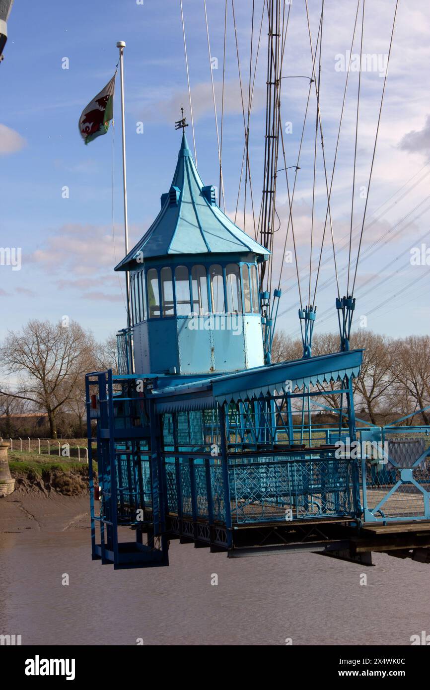 The gondola on Newport Transporter Bridge, a Grade I Listed structure on the river Usk opened in 1906 Stock Photo