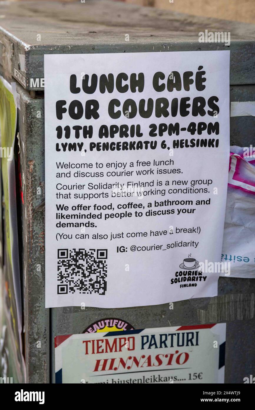 Lunch Café for Couriers. Courier Solidarity poster on a street cabinet in Harju district of Helsinki, Finland. Stock Photo