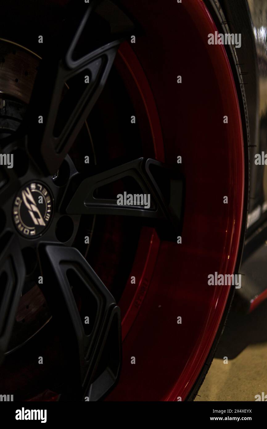 Detail of a red wheel rim of a sport car Stock Photo - Alamy