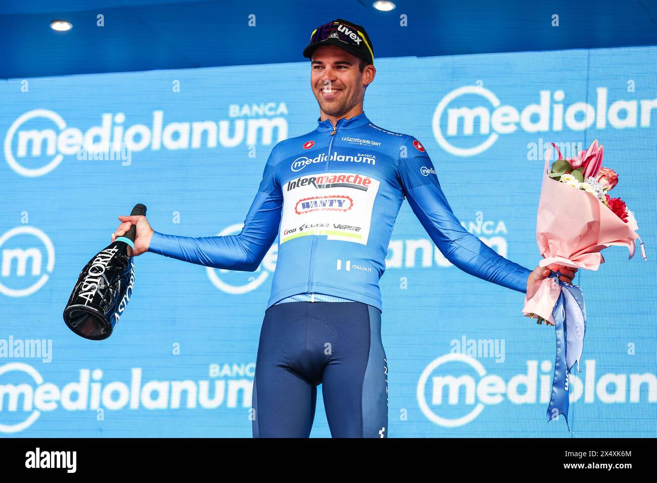 Turin, Italy. 04th May, 2024. Lilian Calmejane of France and Team Intermarche - Wanty celebrates at the podium as Blue Mountain Jersey winner during the 107th Giro d'Italia 2024, Stage 1 a 140 km stage from Venaria Reale to Turin. The 107th edition of the Giro d'Italia, which will take a total of 3400, 8 km, departs from Veneria Reale near Turin on May 4, 2024 and will finish in Rome. (Photo by Fabrizio Carabelli/SOPA Images/Sipa USA) Credit: Sipa USA/Alamy Live News Stock Photo