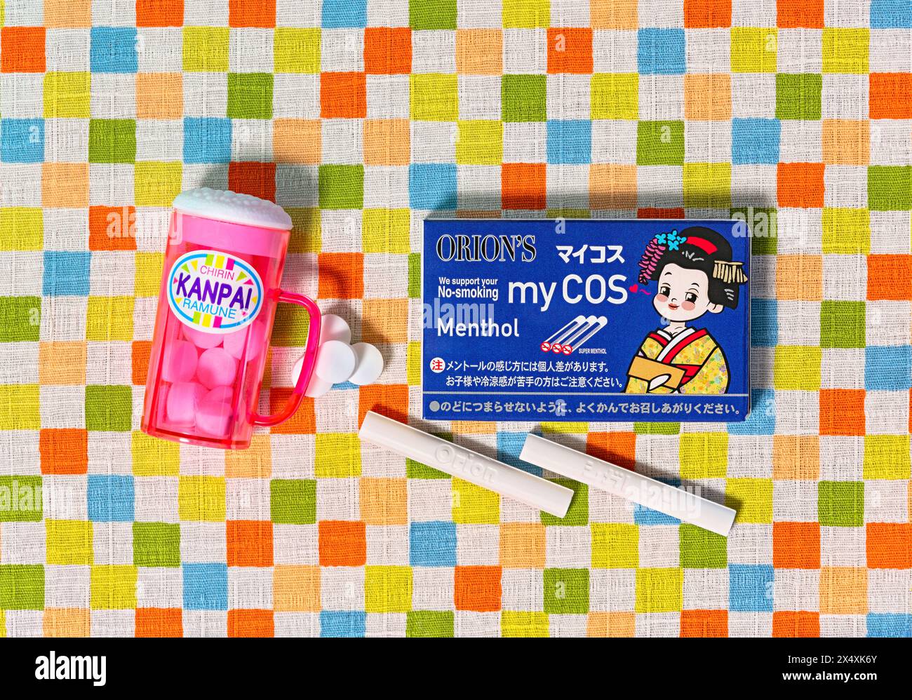 tokyo, japan - fev 17 2024: Top view photo of Japanese confectionery manufacturer Orion's dagashi penny candies featuring cocoa cigarettes pack and a Stock Photo