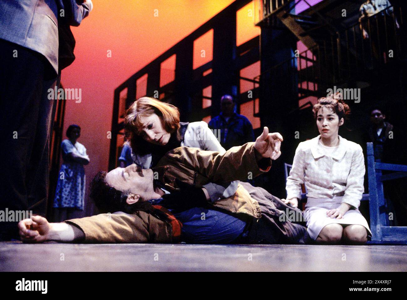 l-r: Bernard Hill (Eddie Carbone), Charlotte Cornwell (Beatrice), Emer McCourt (Catherine) in A VIEW FROM THE BRIDGE by Arthur Miller at the Strand Theatre, London WC2  07/04/1995  design: Shelagh Keegan  director: David Thacker Stock Photo