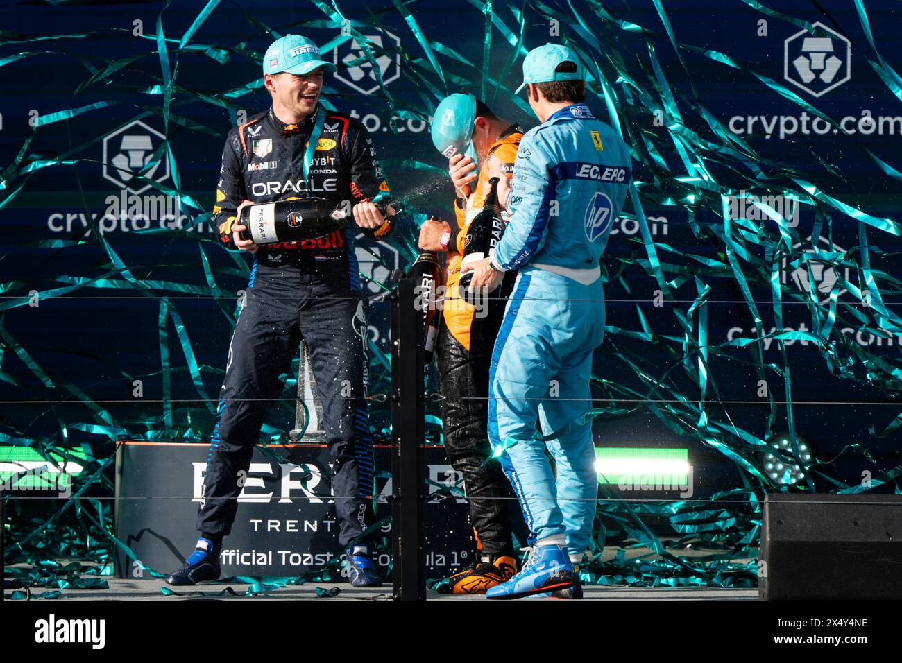 Miami Gardens, United States. 05th May, 2024. Dutch Formula One driver Max Verstappen of Red Bull Racing, British Formula One driver Lando Norris of McLaren F1 Team and Monaco's Formula One driver Charles Leclerc of Scuderia Ferrari spray champagne following the podium ceremony for the Formula One Miami Grand Prix at the Miami International Autodrome in Miami Gardens, Florida on Sunday, May 5, 2024 Photo by Greg Nash/UPI Credit: UPI/Alamy Live News Stock Photo