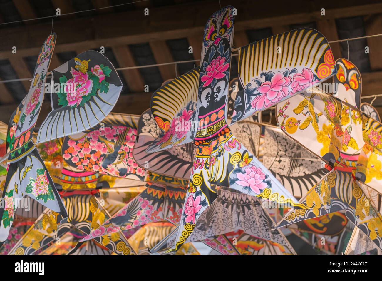 Chinese kites of different style in Ciqikou Old Town, Chongqing, China. Background Stock Photo