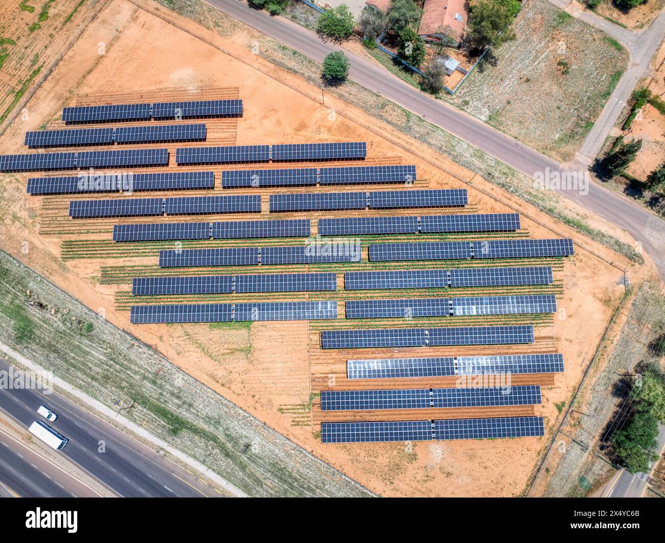 solar panels on the field for agriculture, developing rural areas and cities in africa Stock Photo