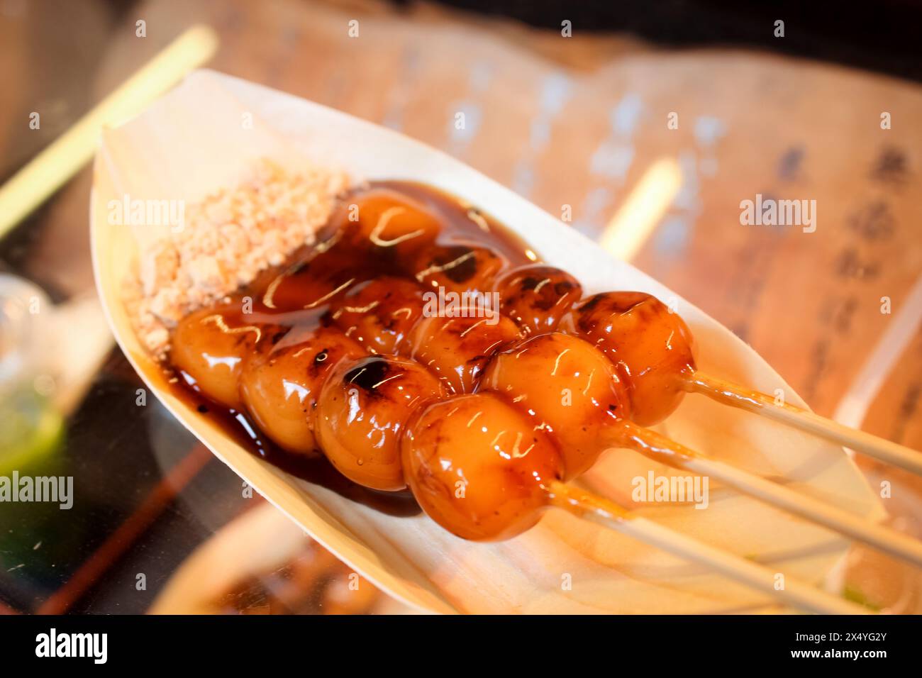 Mitarashi dango Japanese street food with sweet soy sauce Stock Photo