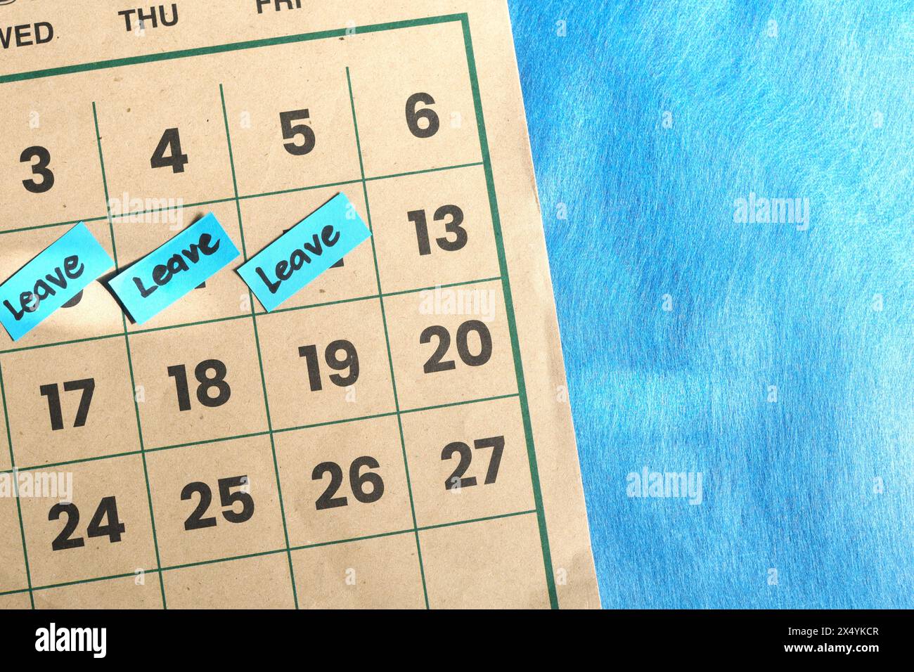 Annual leave from office work concept. Written reminder note on calendar. Stock Photo