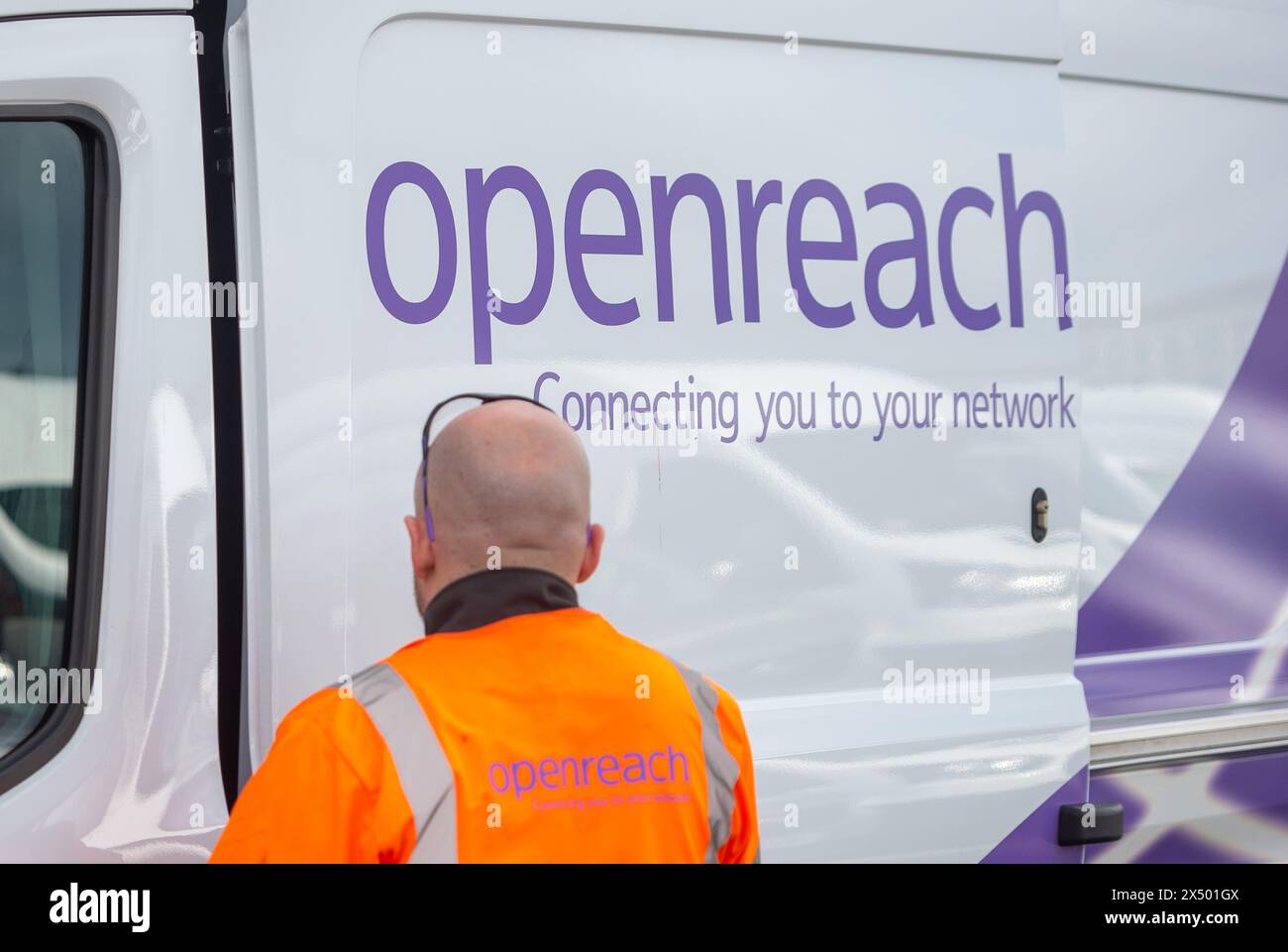 File photo dated 11/03/20 of an Openreach engineer with his van at the Openreach training centre in Peterborough. Openreach has announced a further 84 new exchange locations where it plans to halt the sale of traditional copper-based phone and broadband services to encourage people to upgrade to new digital services over an ultrafast full fibre connection. The move covers more than 880,000 premises across the UK. Issue date: Monday May 6, 2024. Stock Photo