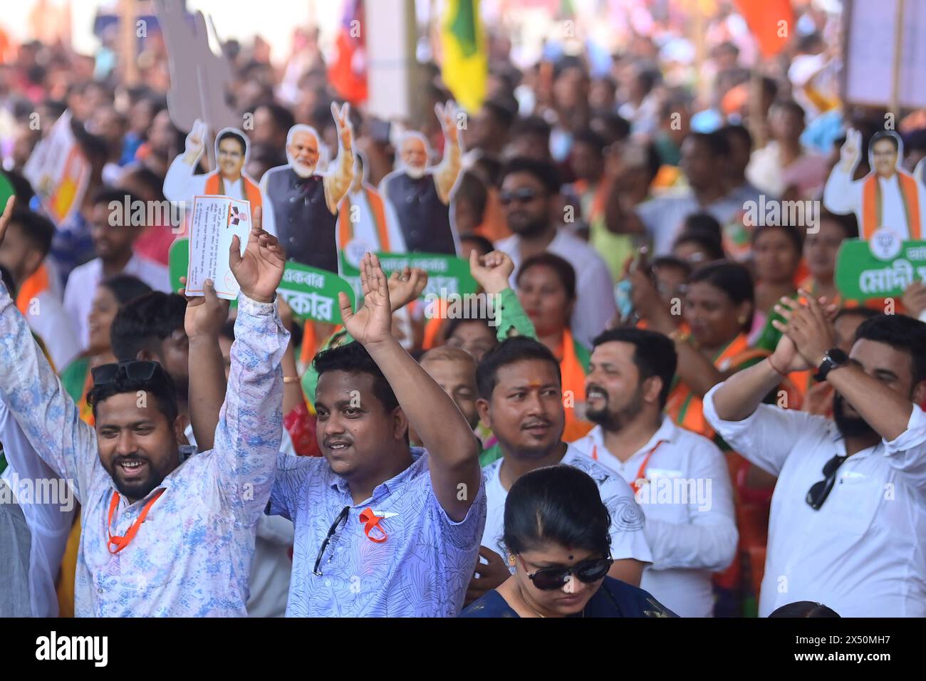 Supporters of the BJP at a rally of Prime Minister Narendra Modi ahead ...