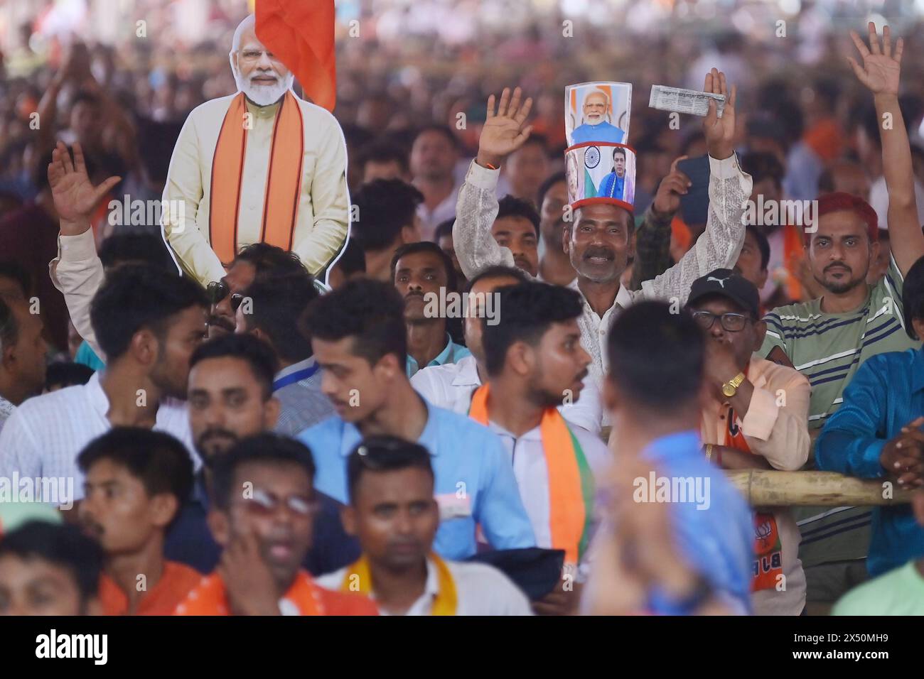 Supporters of the BJP at a rally of Prime Minister Narendra Modi ahead ...