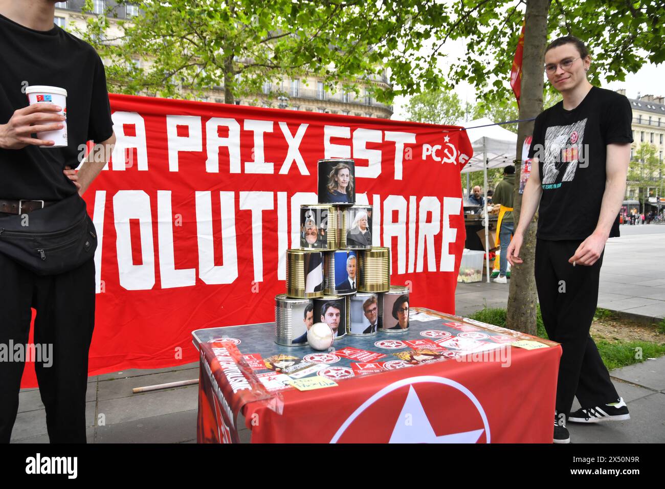 Paris,France,1st of May 2024.Thousands of people protested and celebrated on mayday in Paris.  Labour unions,workers,students and others marched through the streets. Some protesters turned violent,started fires and destroyed businesses. Stock Photo