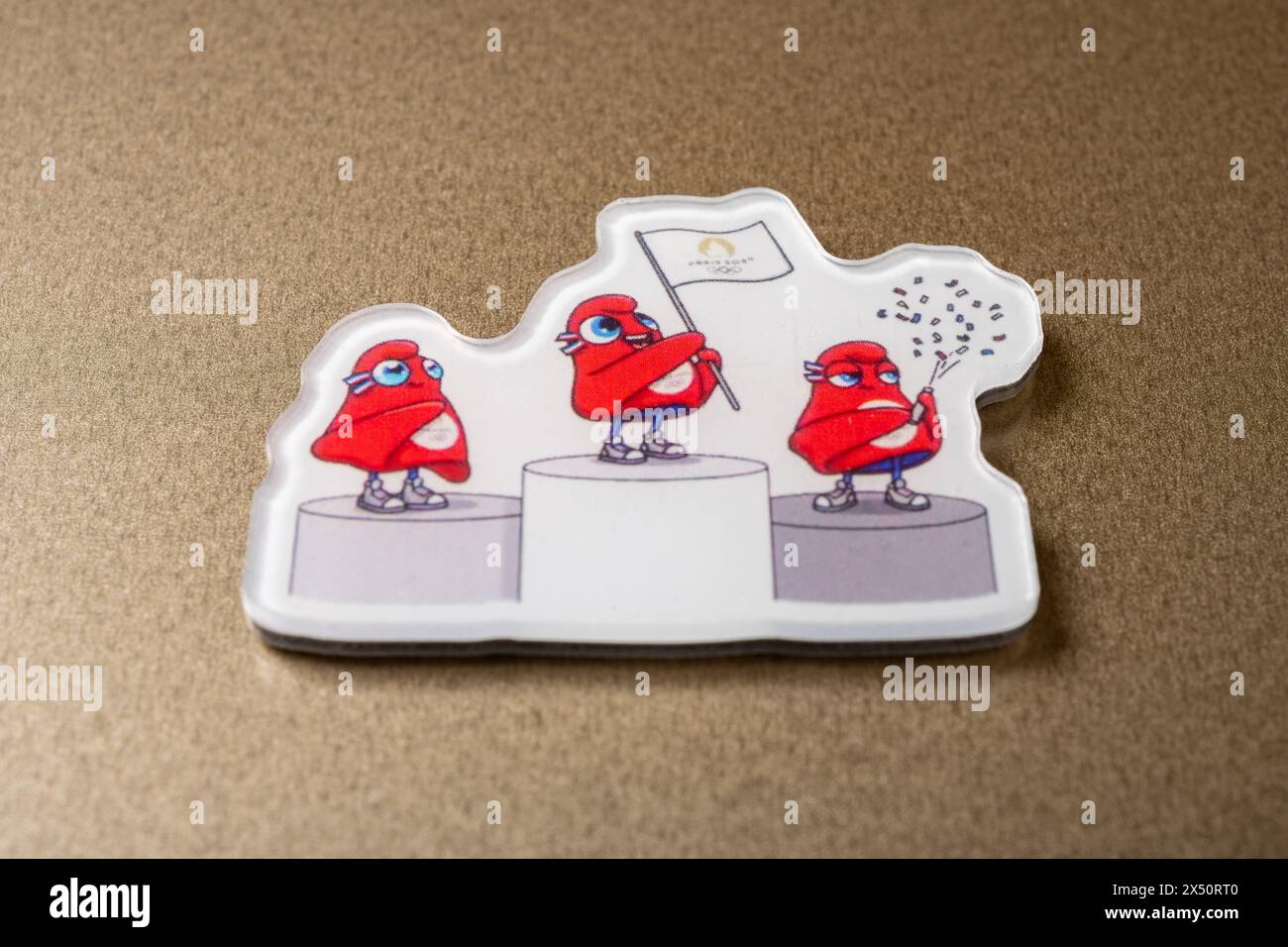 ZHONGSHAN China-April 28 2024: angle view refrigerator magnet with 2024 Paris Olympic Games mascot the Phryges. Stock Photo