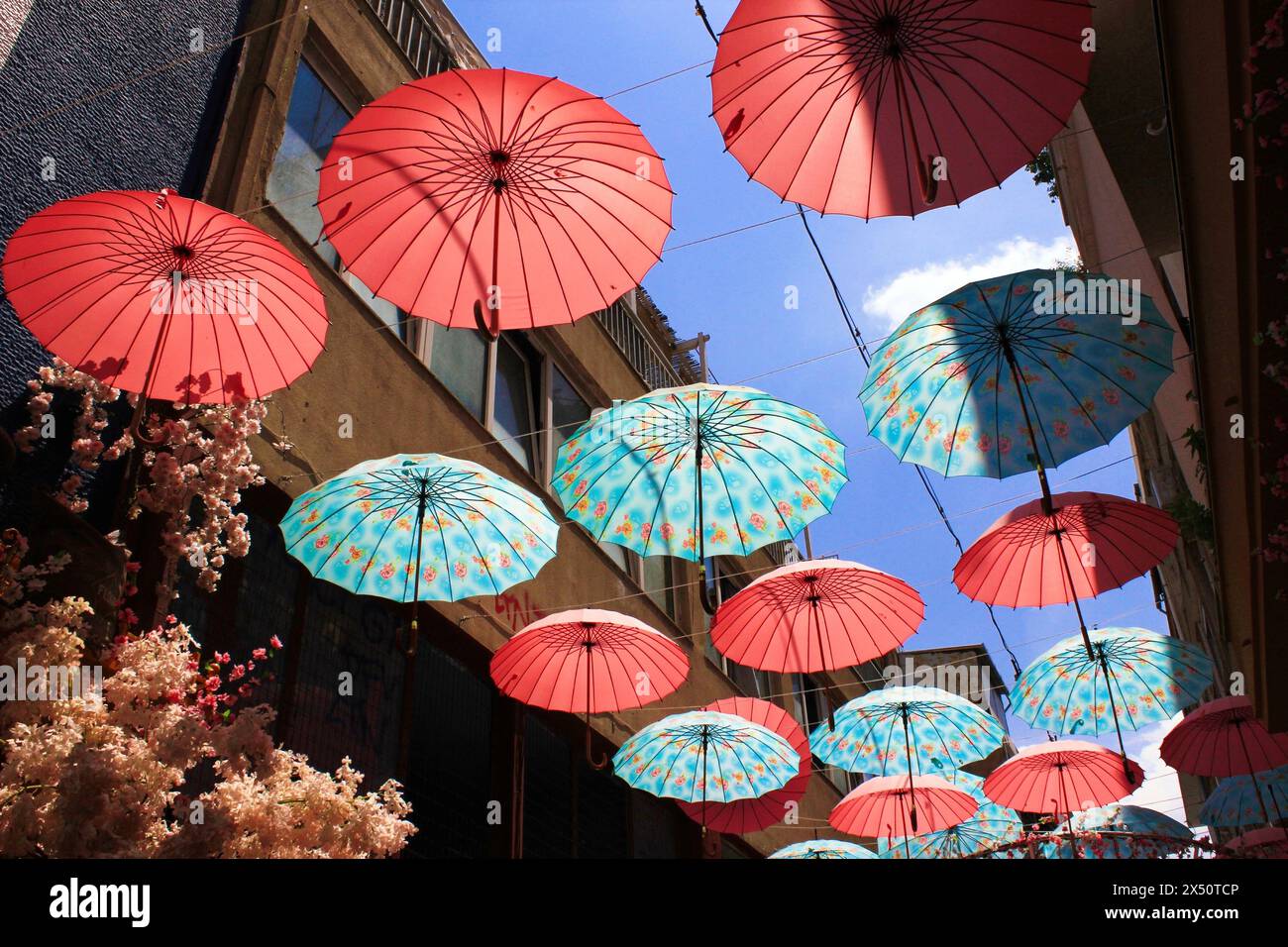 Decorative umbrellas around a fairytale-inspired cafe at Psiri neighbourhood in Athens, Greece, July 27 2020. Stock Photo